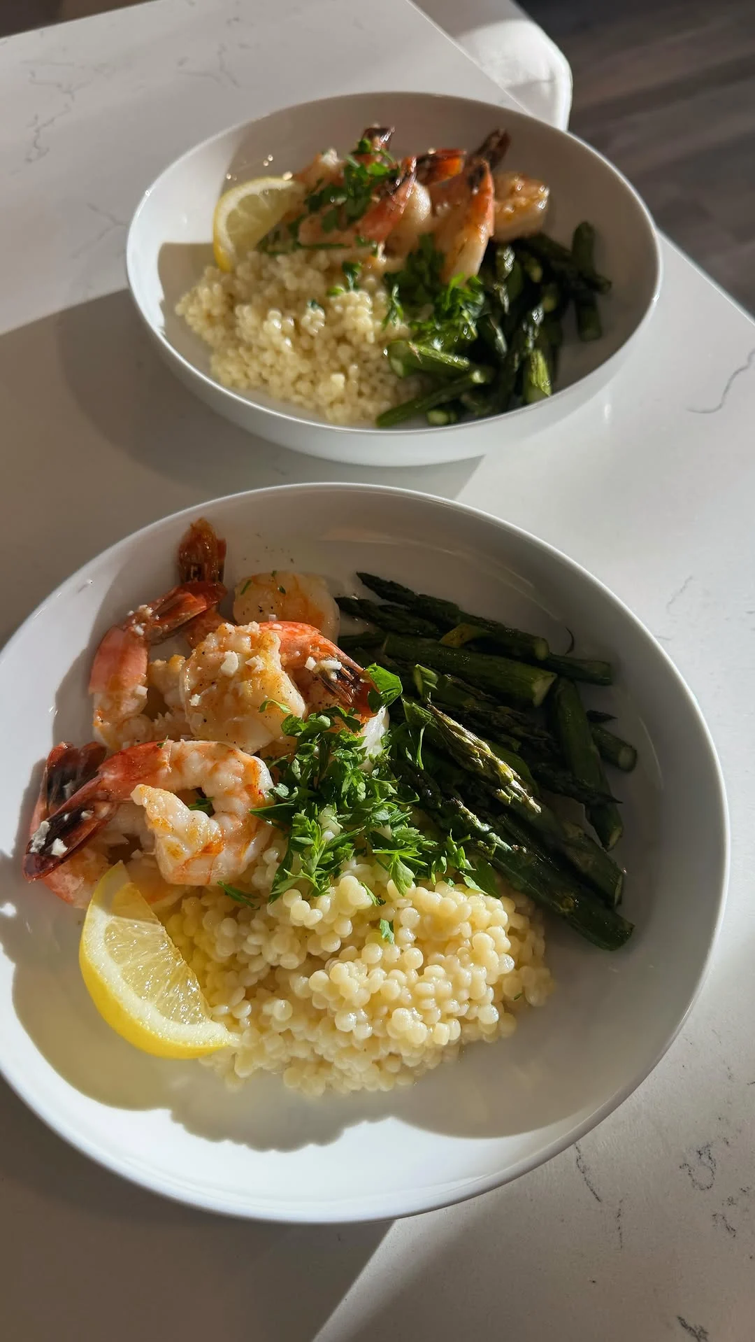 Lemon Garlic Shrimp With Parmesan Couscous And Roasted Asparagus — photo from Instagram