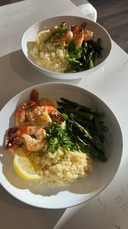 Lemon Garlic Shrimp With Parmesan Couscous And Roasted Asparagus — photo from Instagram